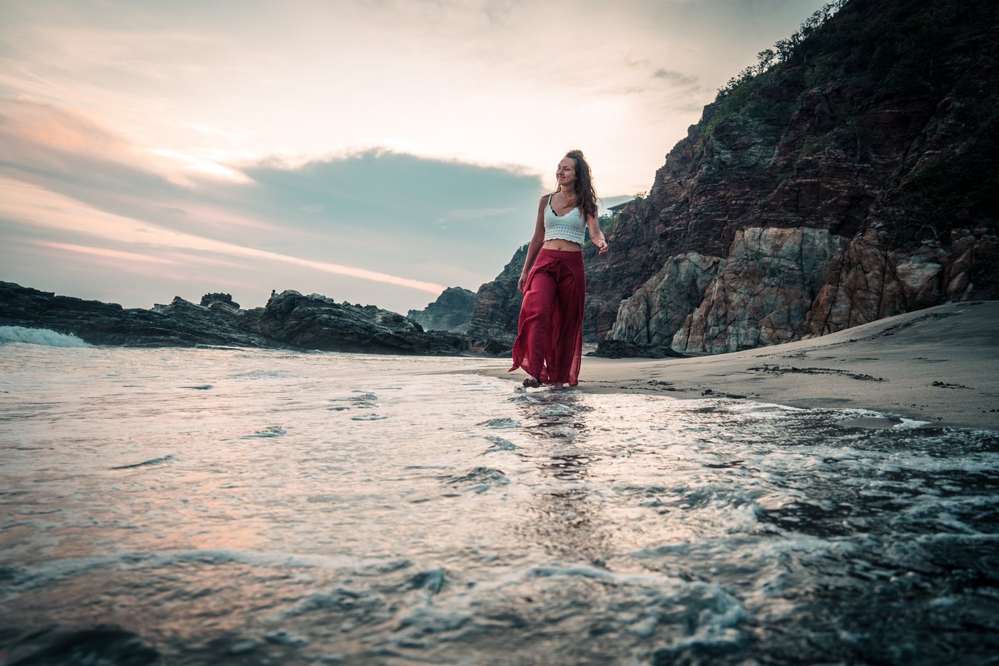 Laura Born walking the coastline in Guatemala